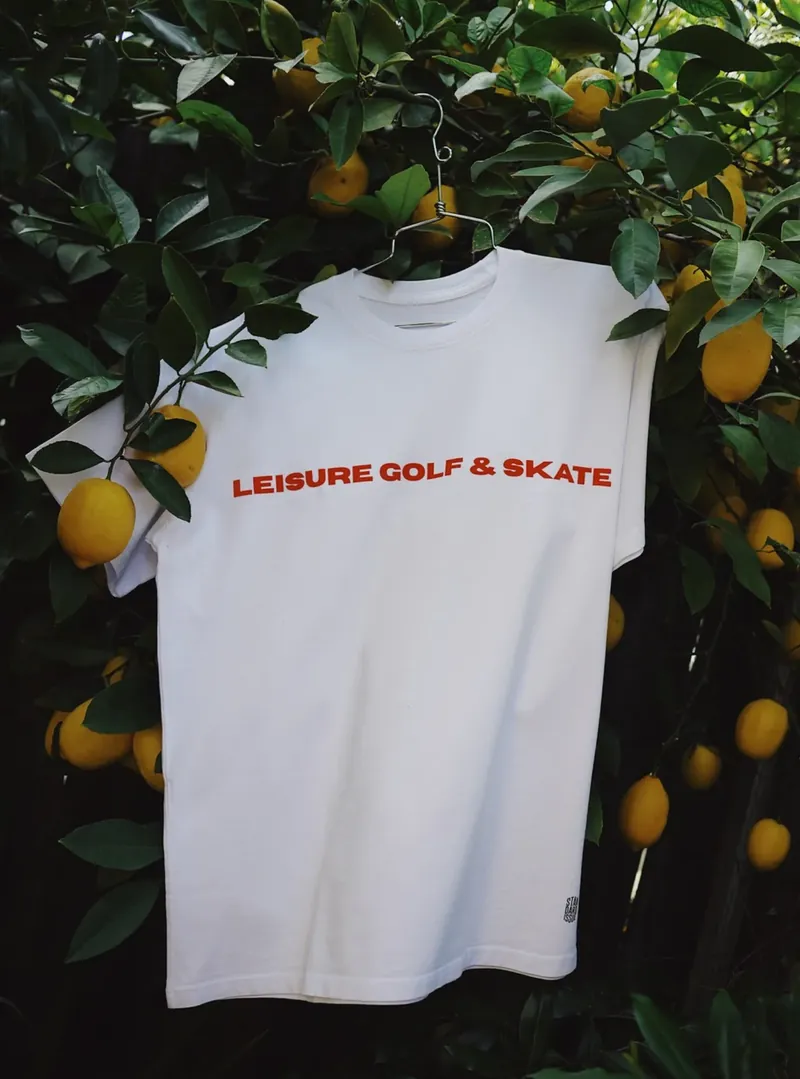 Leisure Golf and Skate tee in a lemon tree